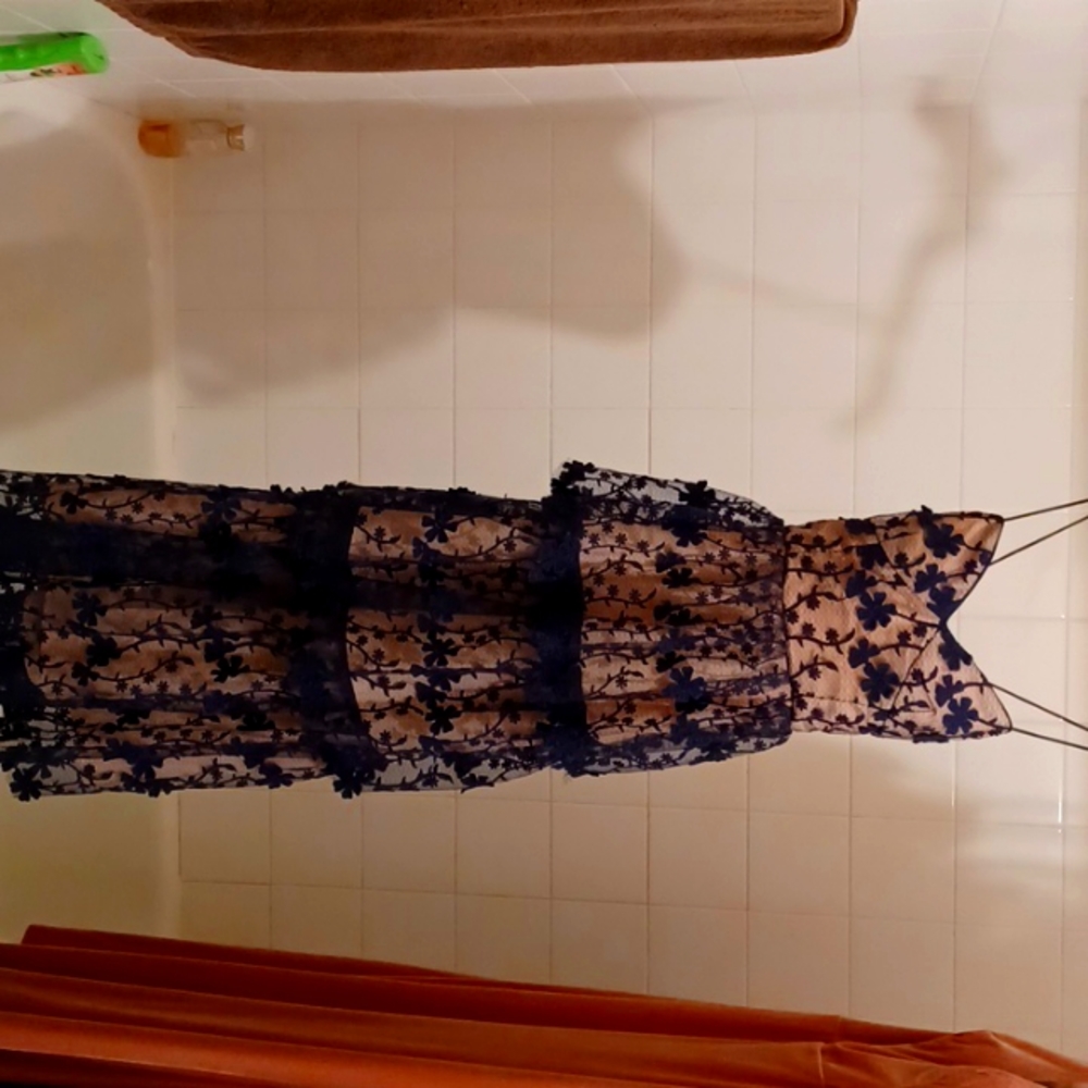 Dress wore to a wedding only once worn. Size small (2-4) color Navy Blue